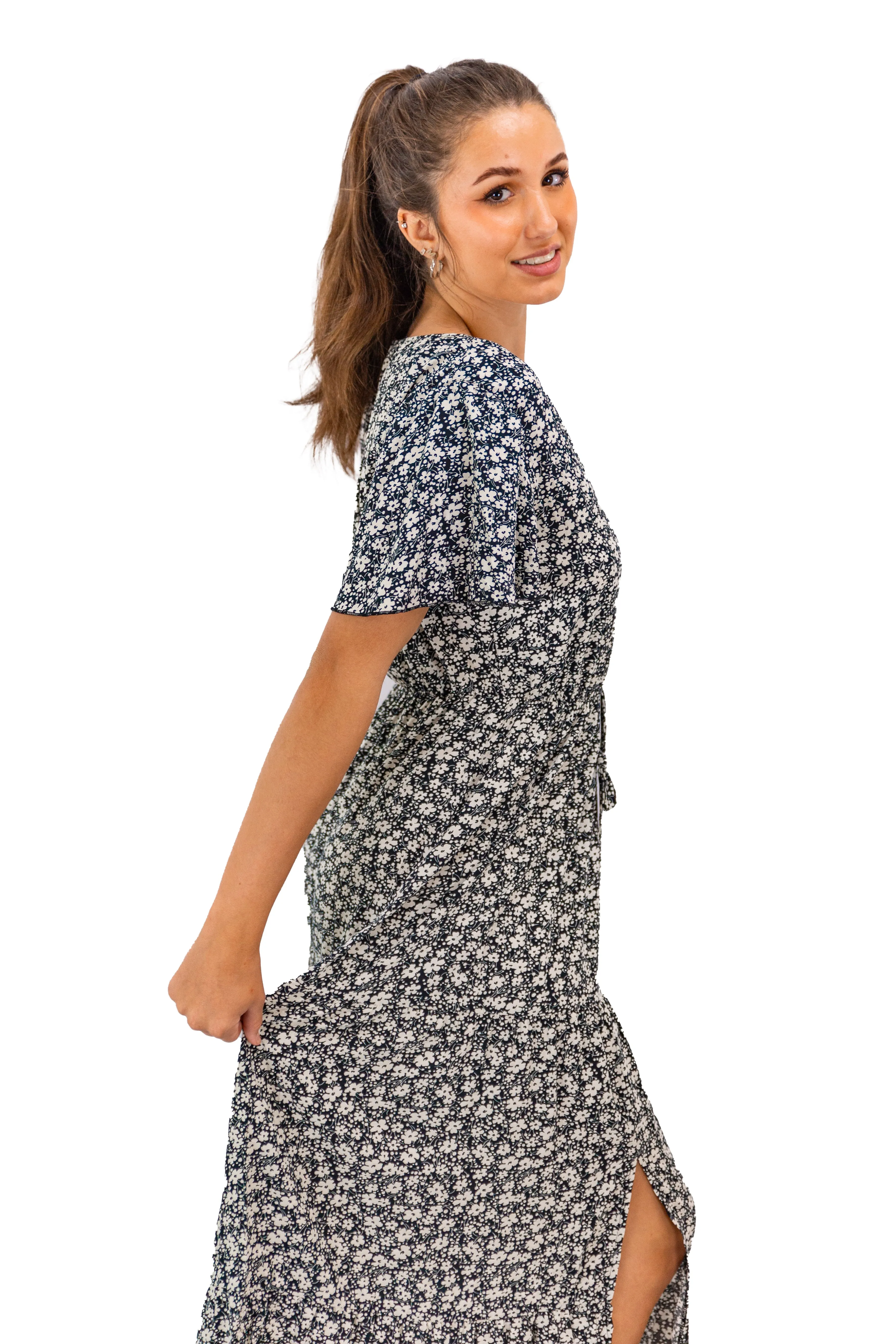 Blossom Elegance: Black Floral Midi with a Twist