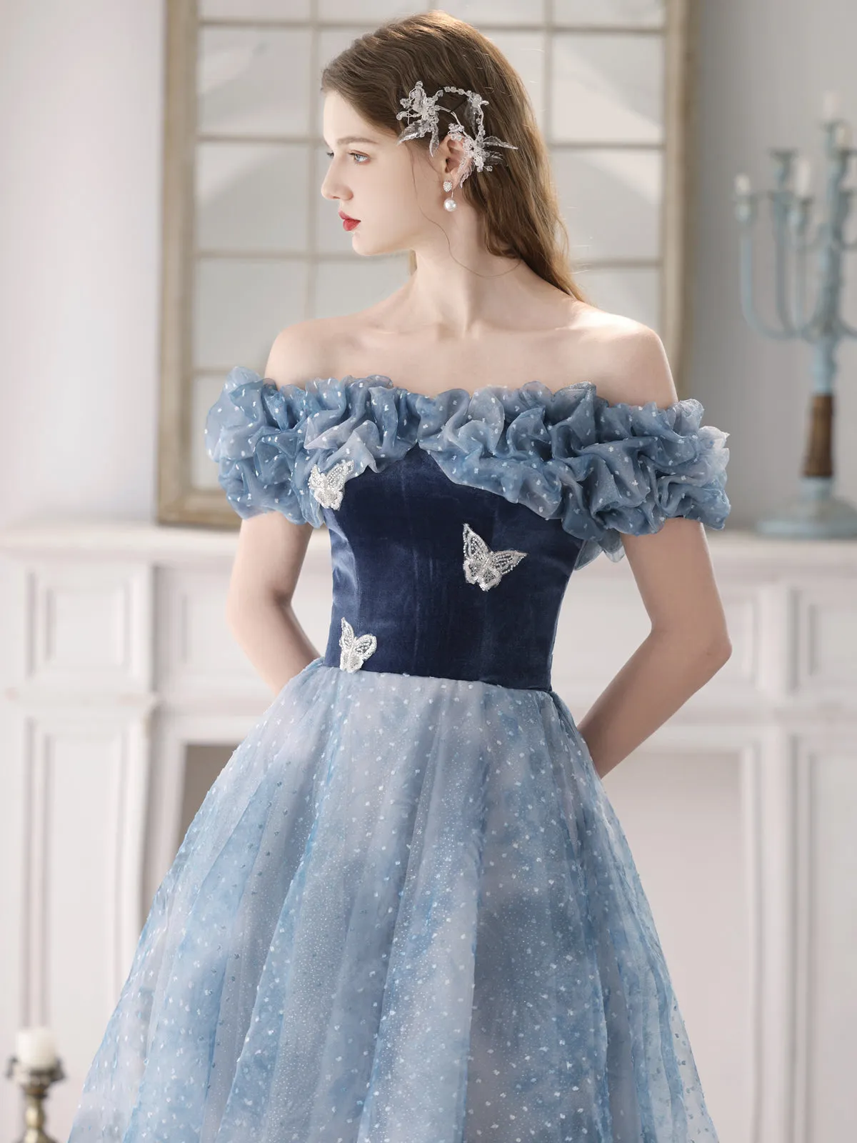 Enchanting Off-Shoulder Blue Tulle Ball Gown with Ruffled Bodice